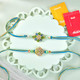 Designer Flower Green Rakhi Set with Ferrero Rochers