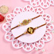 Golden Moti Duos Rakhi with Almond & Lindt Chocolate