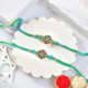 Two Designer Blue Rakhi Mix Choco Hamper