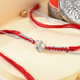 Shree Ganesha Pure Silver Rakhi Sweet and Chocolate Combo
