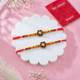 Elegant Diamond Flower Rakhis with Gourmet Hamper