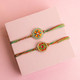 Pair of Colorful Rakhi with Kaju Katli.