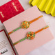 Pair of 2 Splendid Rakhi with Besan Laddu.