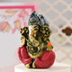 Rudraksha Rakhi With Decorated Ganesha & Chocolate