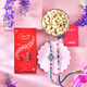 Charming Raja Rani Rakhi Choco Nut Hamper
