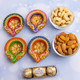 Four Traditional diyas with Dryfruits & Ferrero Rocher