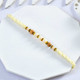 White Beaded Rakhi With 4 Pcs Rocher