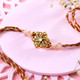 Floral Shaped Rakhi With Little Hearts