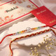 Ek Onkar Beaded & Red-Gold Braided Rakhi Set