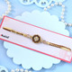 Rose Gold Flower Rakhi