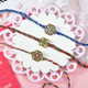 Three Minakari Rakhi