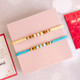 Two Hand Crafted Beads Rakhi With Kaju Katli