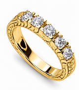 Antique engraved prong set round lab grown diamond quality cubic zirconia anniversary band in 14k yellow gold.