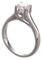 Round lab grown diamond simulant cubic zirconia trellis styled intertwined criss cross solitaire engagement ring in solid 14k gold.