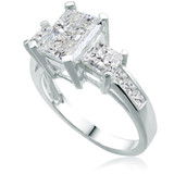 Three stone emerald radiant cut and princess cut lab grown diamond look cubic zirconia engagement ring in 14k white gold.