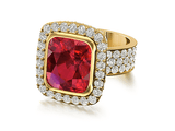 Avellina 7 carat emerald radiant cut halo simulated diamond cubic zirconia ring in 14k yellow gold.