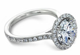 Round 2.5 Carat Micro Pave Halo Engagement Ring with laboratory grown diamond look cubic zirconia in platinum.