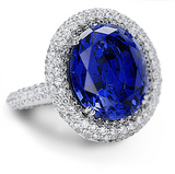 Alessandria 6.5 carat oval laboratory grown cubic zirconia micro pave set halo engagement ring in 14k gold.