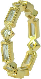 Emilia laboratory grown diamond look cubic zirconia eternity band diamond look alternating princess cut and baguettes in 14k gold.