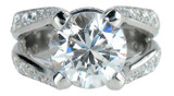 Burke 4 carat round and pave lab grown diamond look cubic zirconia split shank solitaire engagement ring in platinum.