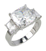 Lena cushion cut and emerald radiant cut lab grown cubic zirconia three stone ring in 14k white gold.