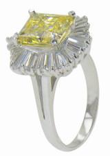 Emerald radiant cut 2.5 carat lab grown diamond alternative cubic zirconia halo cluster ballerina ring in 14k gold.