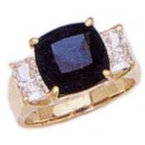 Tsoler 5.5 carat cushion cut with emerald cut lab grown diamond alternative cubic zirconia side stones in 18k yellow gold.