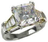 Cushion cut 4 carat channel set baguette lab grown diamond alternative cubic zirconia solitaire engagement ring in 14k two tone gold.