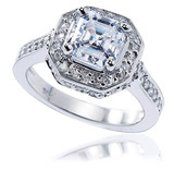 Elegant 2.5 carat asscher cut laboratory grown diamond look cubic zirconia cathedral halo pave set solitaire engagement ring in 14k white gold.