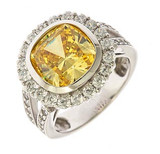 Radiant cut 7 carat cushion cut lab grown diamond quality cubic zirconia bezel set split shank engagement ring 14k white gold.