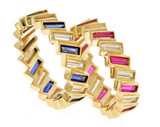 Bezel set lab grown diamond simulant cubic zirconia and man made sapphire, ruby and emerald baguette in 14k gold.
