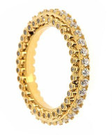 Bezel and prong set round laboratory grown diamond alternative cubic zirconia eternity wedding band in 14k yellow gold.