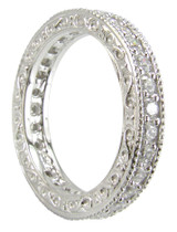 Engraved pave set round milgrain lab grown diamond alternative cubic zirconia eternity band in platinum.
