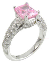 Pink 1.5 carat emerald radiant cut lab grown diamond simulant cubic zirconia cathedral pave encrusted engagement ring in 14k white gold.