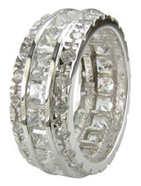 Princess cut and round lab grown diamond alternative cubic zirconia channel set eternity band in 14k white gold.