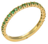 Stackable pave set round man made emerald gemstone anniversary band in 14k yellow gold.