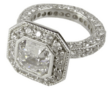 Asscher cut 2.5 carat bezel set lab grown diamond alternative cubic zirconia pave round halo engagement ring in platinum.
