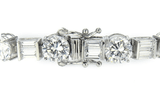 Alternating Round and Baguette Bracelet with lab grown diamond quality cubic zirconia in 14k white gold.