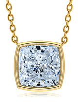 Cushion cut square bezel set lab created diamond alternative cubic zirconia solitaire pendant in 14k yellow gold.