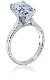 Elongated cushion cut lab grown diamond alternative cubic zirconia cathedral solitaire engagement ring in platinum.
