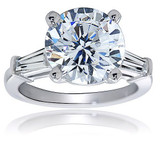 Round 1.5 carat lab grown diamond alternative cubic zirconia baguette solitaire engagement ring in 14k white gold.