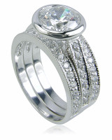 Valencia three ring bezel set round lab grown cubic zirconia and micro pave wedding set in 14k white gold.