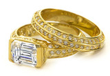 Emerald 2.5 Carat Radiant Cut Semi Bezel Pave Wedding Set with lab grown diamond simulant cubic zirconia in 14k yellow gold.