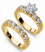 Round 1 Carat Antique Engraved Bridal Set with lab grown diamond look alternative cubic zirconia in 14k yellow gold.