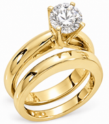 Wide 1.5 Carat Round Four Prong Cathedral Wedding Set with high quality lab created diamond look cubic zirconia in 14k yellow gold.