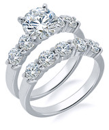 Scalloped 1.5 Carat Round Wedding Set with lab grown diamond look cubic zirconia in 18k white gold.