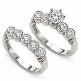 Scalloped Bezel Round 1 Carat Wedding Set with lab grown diamond look cubic zirconia in 14k white gold.