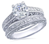 Engraved 1.5 Carat Round Trellis Luccia Wedding Set with lab grown diamond simulant cubic zirconia in 14k white gold.