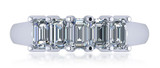 Emerald cut .50 carat lab grown diamond simulant cubic zirconia five stone anniversary band in 18k white gold.