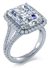 Emerald cut 7 carat micro pave lab created cubic zirconia halo engagement ring in 18k white gold.